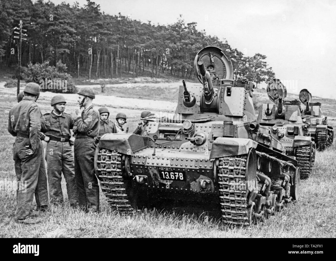 Maneuver of the Czechoslovak Army with tanks at Milowitz (today Milovice). The soldiers are standing next to tanks Type 10. In the Sudetenland Crisis, Czech soldiers are fighting against Sudeten German soldiers. Stock Photo