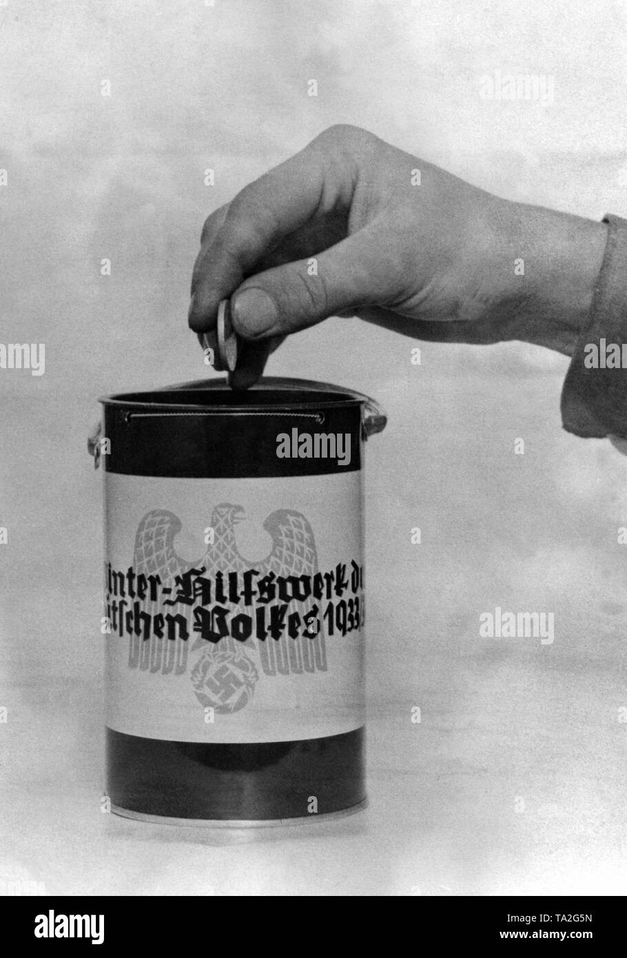 Propaganda image of a collecting box of the Nazi Winter Relief. Stock Photo