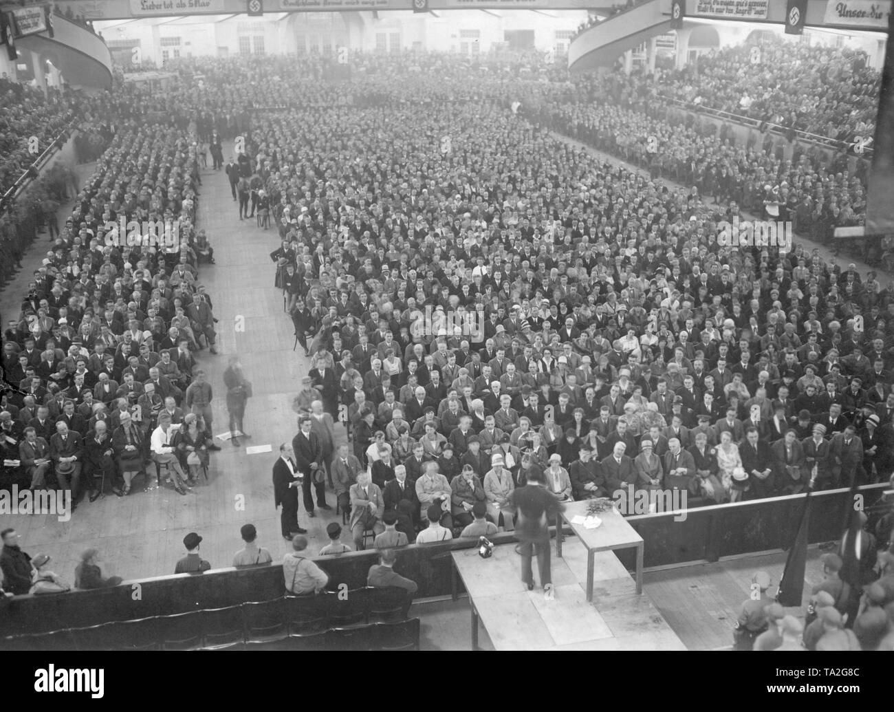 Joseph Goebbels speaks in front of the audience at a meeting of the NSDAP in the Sportpalast in Berlin. Stock Photo