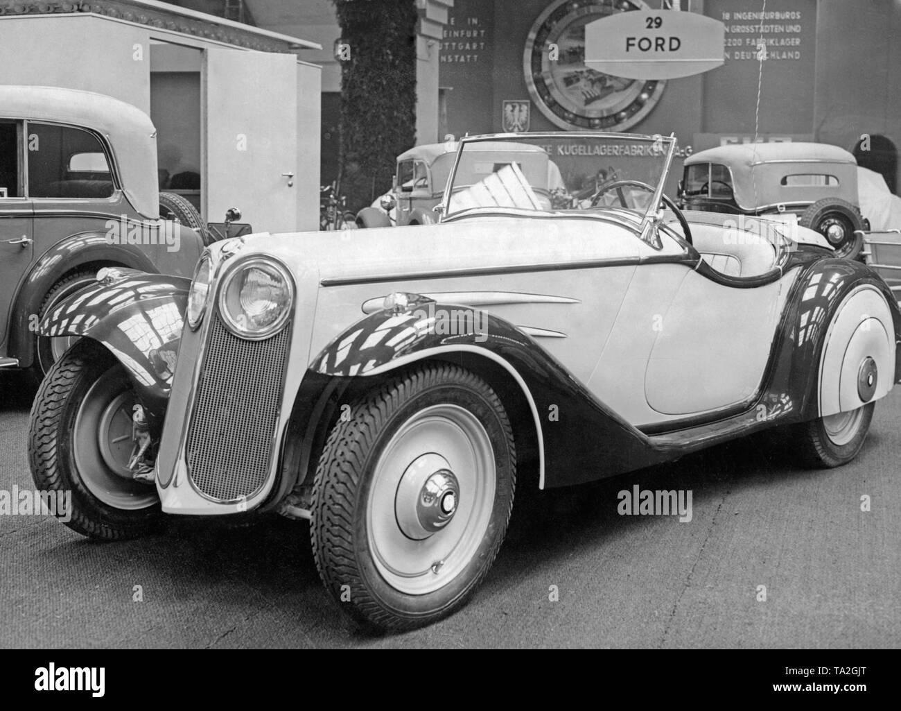 Premiere of the BMW 315 Roadster in a body variant with headlamps embedded in the radiator grille at the International Motor Show in the Kaiserdamm in Berlin in 1934. Stock Photo