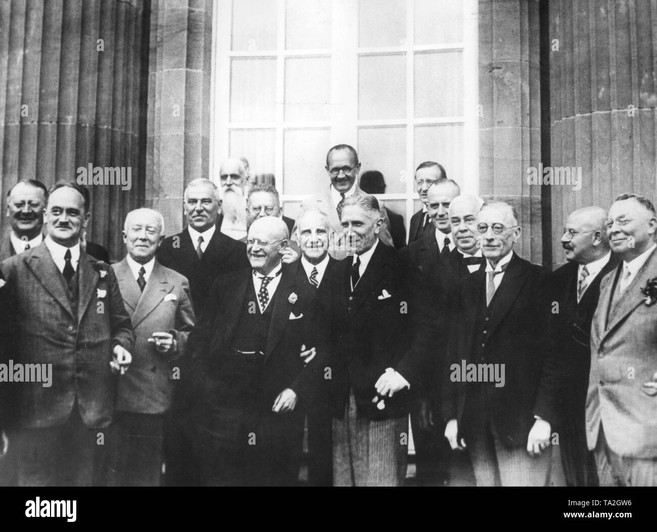 At a meeting with the prime ministers of all German states Chancellor Franz von Papen speaks about the so-called Prussian coup and the subsequent state of emergency. First row (from left to right): Werner Kuechenthal (Braunschweig, far left), Bernhard Adelung (Hessen), Walther Schieck (Saxony), Josef Schmitt (Baden), Mr. Rieper, Heinrich Held (Bavaria), Chancellor Franz von Papen, Wilhelm Bazille (Wuerttemberg Minister of Culture), Minister of the Interior Wilhelm Freiherr von Gayl, Gustav Adolf Dehlinger, and Fritz Schaeffer (Minister of State in the Bavarian Ministry of Finance). Stock Photo