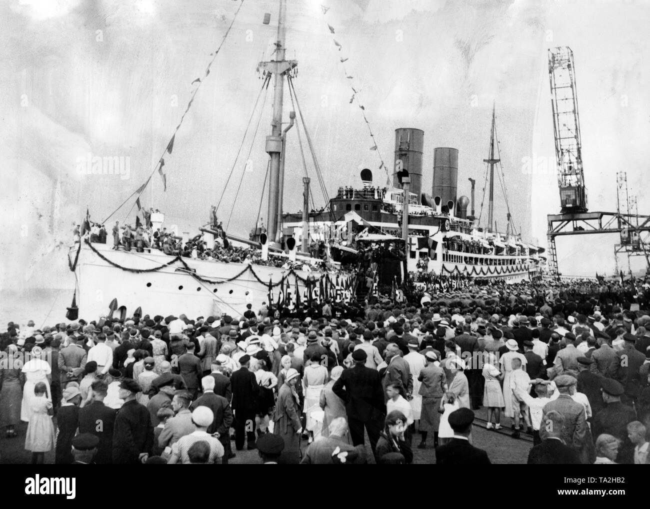 View of the renaming celebration of the passenger ship 'Sierra Morena' of the North German Lloyd. On this occasion was rechristened the cruise ship 'Der Deutsche' of the DAF and of the Nazi organization 'Kraft durch Freude' ('Strength through Joy') in the Port of Hamburg. Stock Photo
