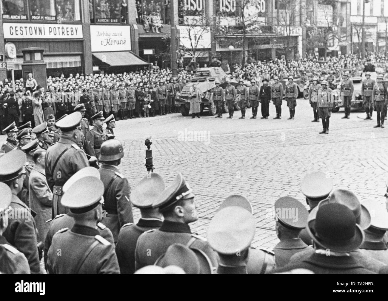 The SS Leibstandarte arrives in Prague after being deployed to the Eastern Front. The soldiers are welcomed at Wenceslas Square. Hitler started World War II by attacking Poland in September. Stock Photo