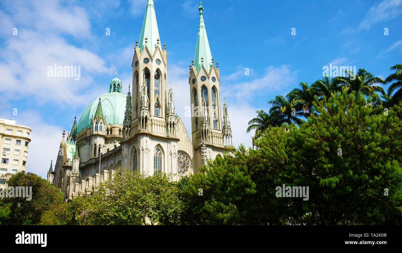 View of Se Cathedral between trees in Sao Paulo, Brazil Stock Photo