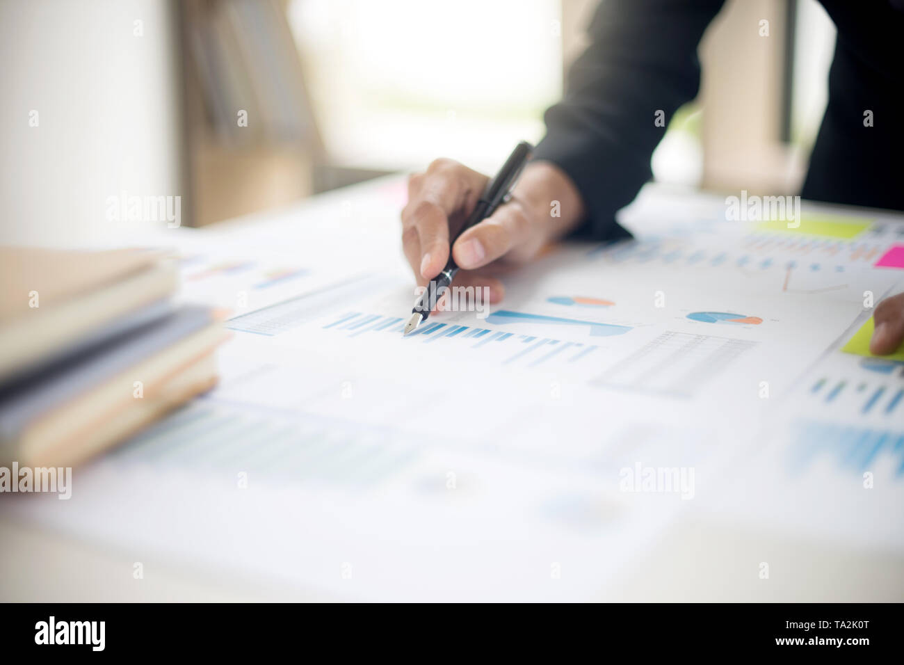 business businessman in meeting analyses chart graphy marketing plan in business project Stock Photo