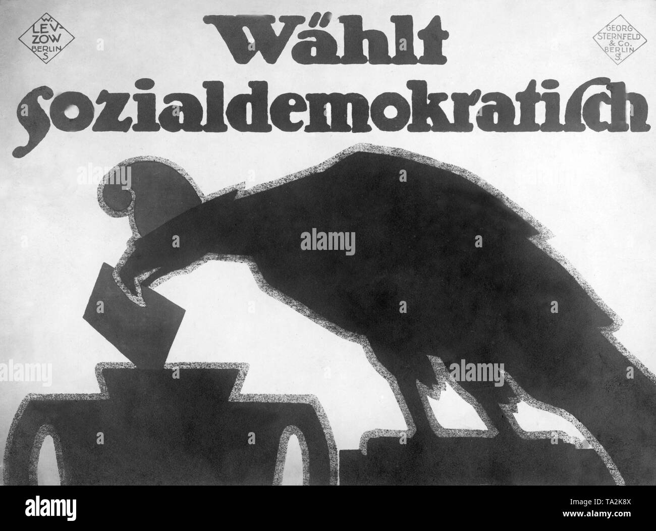 Election poster of the SPD for the election of the National Assembly , which demands to vote for Social Democrats and shows the Reichsadler (imperial eagle), that places his ballot in the voting box. Stock Photo