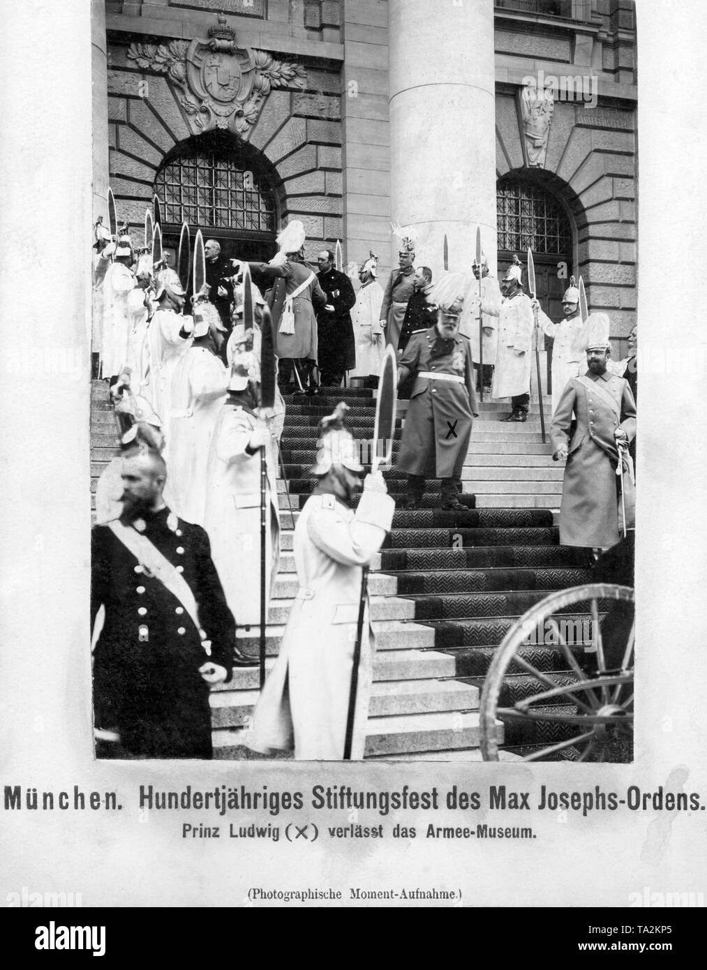 This photograph shows Prince Ludwig, later King Ludwig III of Bavaria (middle) leaving the Army Museum on the occasion of the Centennial Stiftungsfest (Founder's Day) of the Military Order of Max Joseph. It is the highest military order of merit, which was founded in 1806 by the Bavarian king Maximilian I Joseph. The duty of each member of the order was the 'bravery for the Fatherland'. The medal was a gold and white Maltese cross. Bavarian owners of this order were also appointed to the non-inheritable nobility and thus became 'Knights of'. Stock Photo