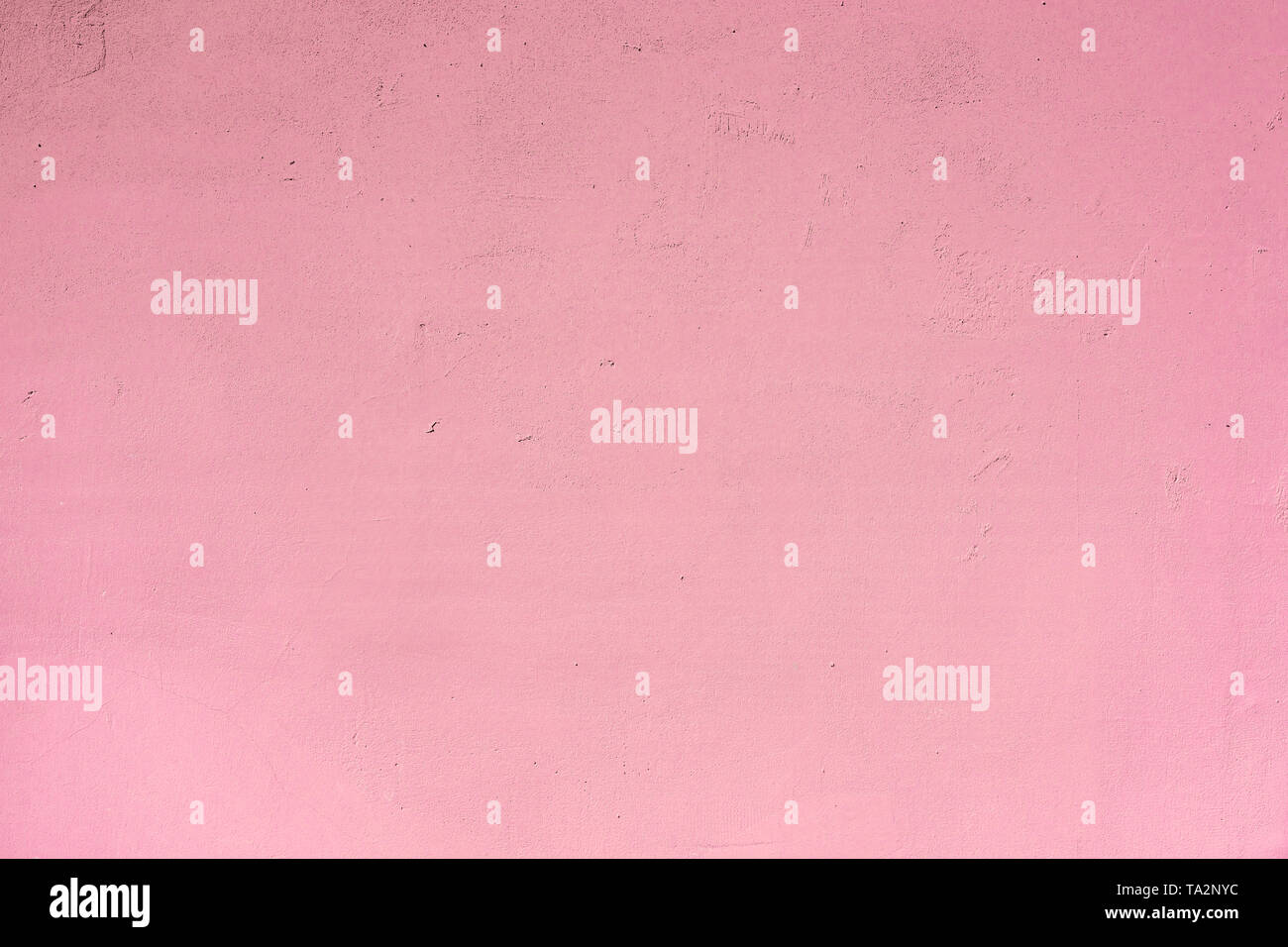 Concrete wall painted light pink Stock Photo