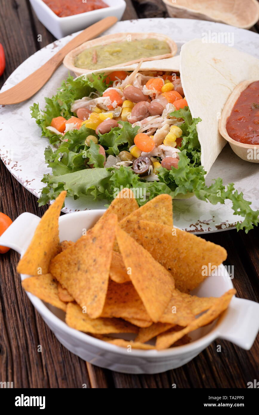 Mexican burrito with tortilla and sauces Stock Photo Alamy