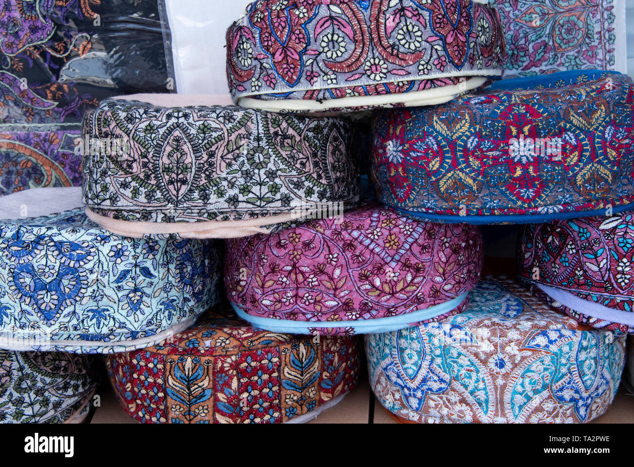 Oman, capital city of Muscat, Muttrah Souk. Traditional embroidered kuma (menâ€™s hat) part of the Omani national dress. Stock Photo