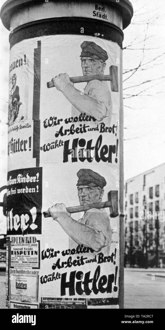 The NSDAP campaigns with a poster that illustrates a worker saying 'We want work and bread! Vote for Hitler! ' Stock Photo