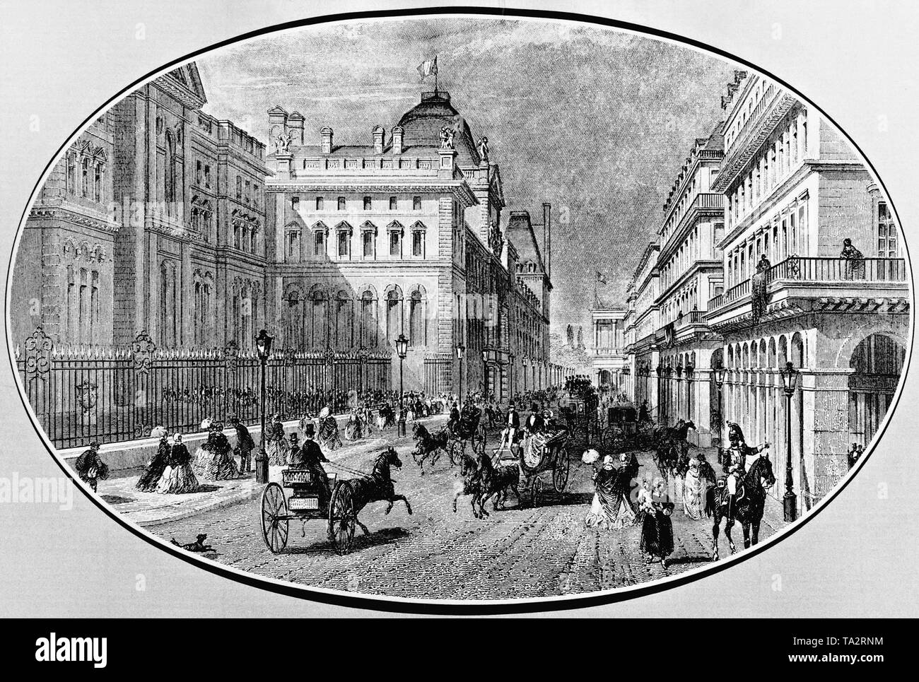 Horse-drawn carriages in the Rue de Rivoli, left you can see the Louvre. Stock Photo