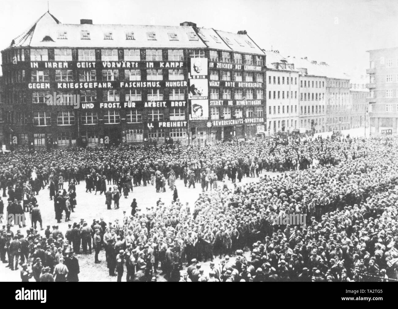 In 1933, in the course of the ban on the Communist Party after the Reichstag fire, the SA occupies the headquarters of the party, the Karl Liebknecht House. On the facade of the house there are still slogans: 'Forward in the fight against war, Fascism, hunger and cold, for work, bread and freedom' and next to it 'Influenced by Leninism, Red workers strengthen the revolutionary trade union opposition'. Pictures of Lenin, Karl Liebknecht and Rosa Luxemburg were mounted on the houses. Stock Photo