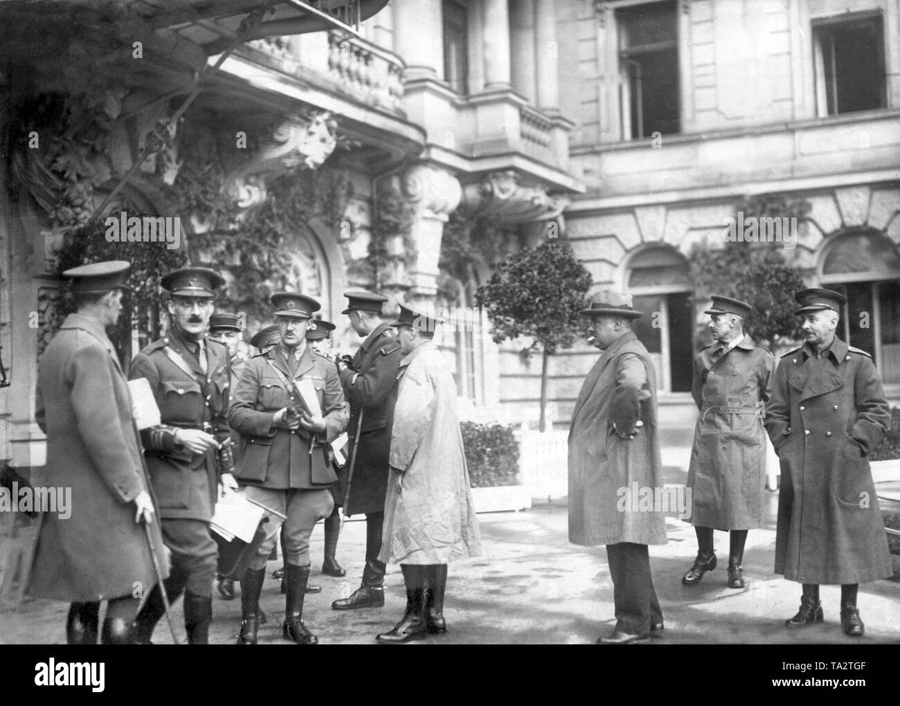 Under the Locarno Treaty, a part of the occupied Rhineland was cleared by the Allies. Here, English officers leave a hotel in Wiesbaden. Stock Photo