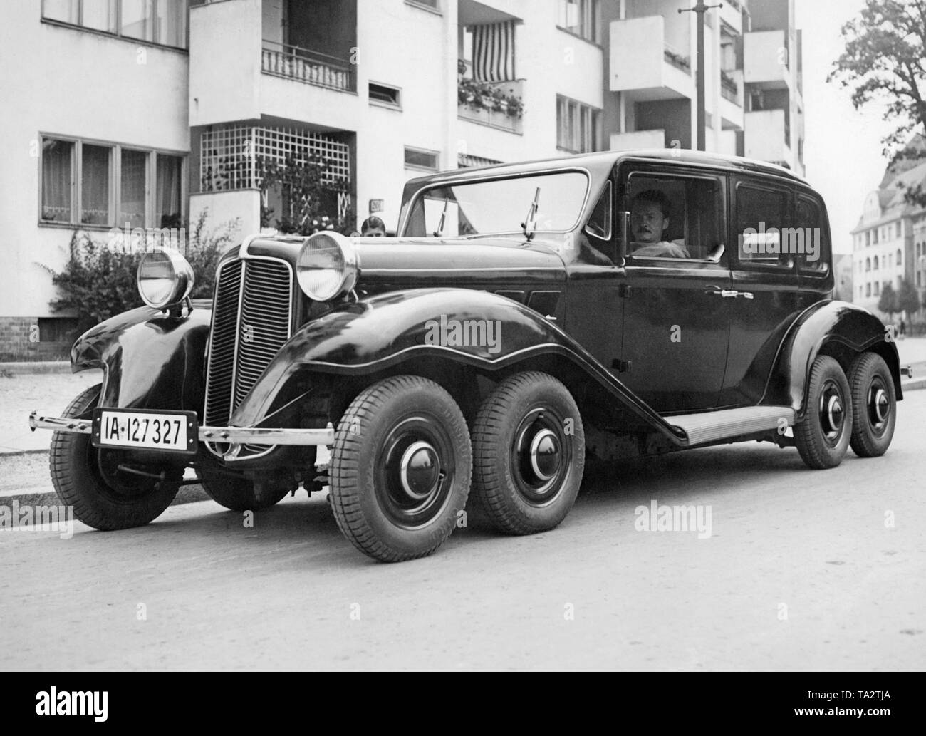 A car with extended wheelbase, four axles and eight wheels, designed by the Berlin engineer Rimmek. Stock Photo