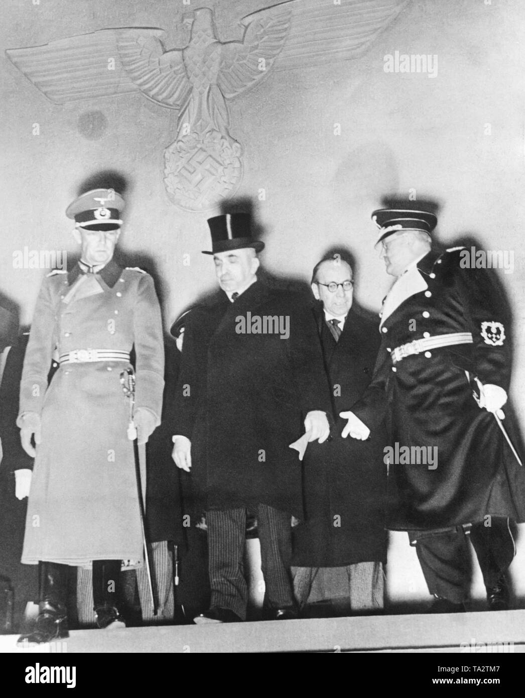 Town Major of Berlin Seifert, Czech President Emil Hacha, Czech Foreign Minister Frantisek Chvalkovsky and Secretary of State Otto Meissner meeting in the New Reich Chancellery in Berlin. The politicians are discussing the transformation of the Czech Republic into the Protectorate of Bohemia and Moravia. Stock Photo