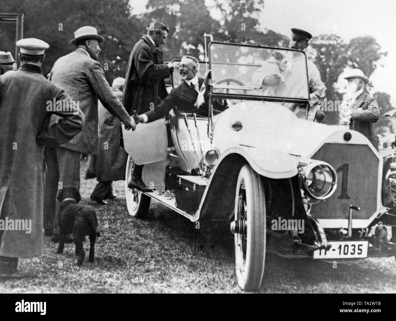 Prince Henry, brother of Emperor Wilhelm II greets, as guest of honor of a car race in Badminton, the host Duke of Beaufort. Stock Photo