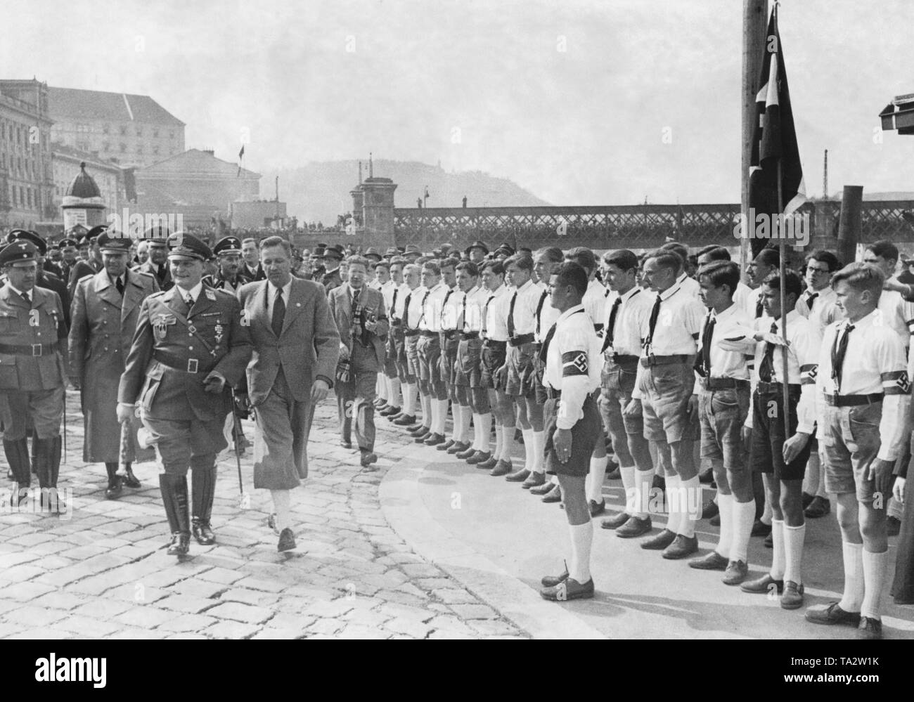 Hermann Goering is welcomed in Linz by the Hitler Youth. The Reich Minister visited Austria at the time of the annexation of Austria to the German Reich. Stock Photo