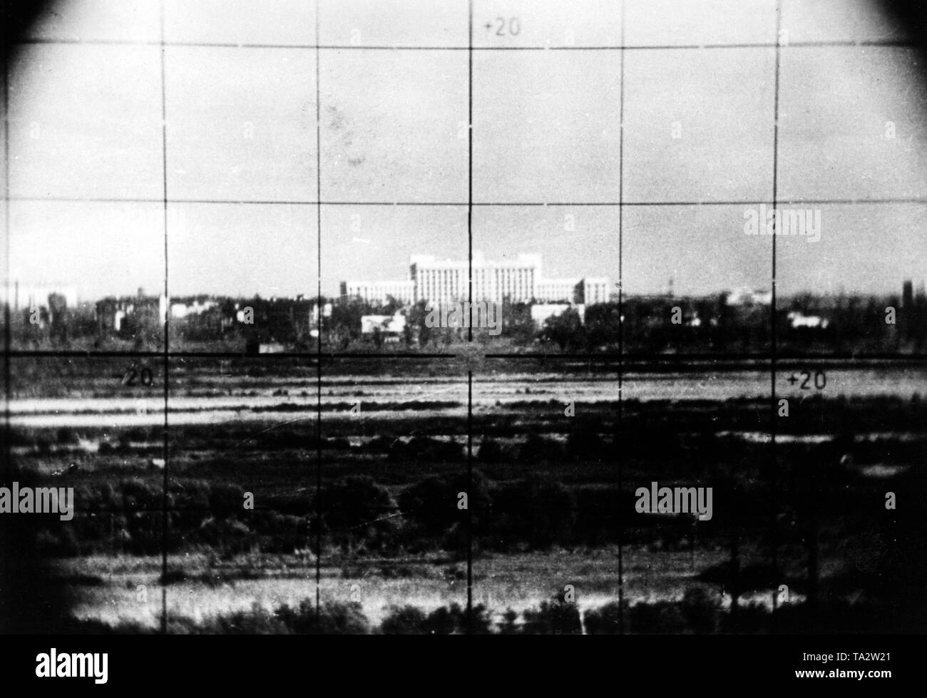 Photo of the Leningrad outskirts taken with a scissors telescope. In the center, the former Party House of the Communist Party. Photo of the Propaganda Company (PK): war correspondent Freytag. Stock Photo