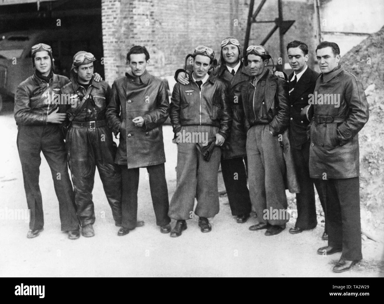Photo of a group of fighter pilots of the government troops in uniform or flight suit (May 6, 1937 ) after the air attack and the sinking of the Spanish national battleship 'Espana' off the coast of Santander on 30 April, 1937. Stock Photo