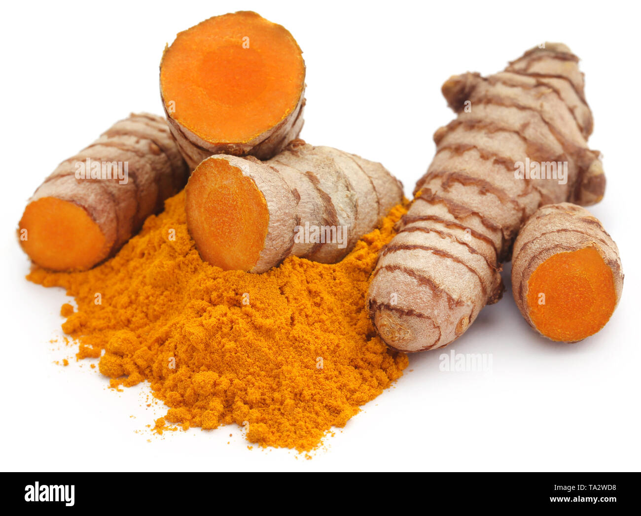 Raw turmeric with powder over white background Stock Photo Alamy