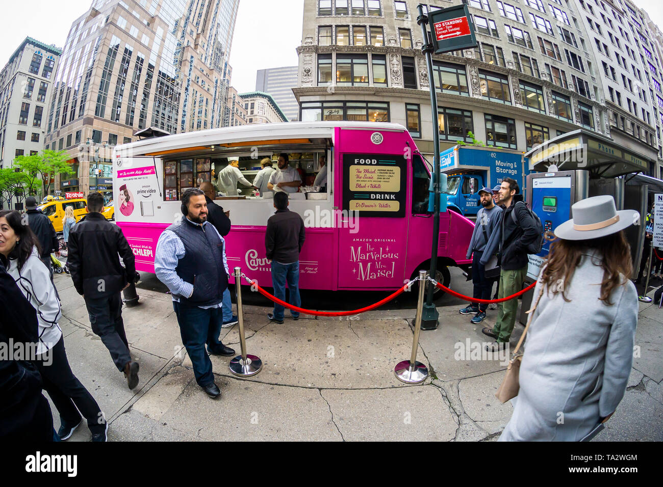 A “Carnegie Deli” food truck promoting the Amazon Prime Video series “The Marvelous Mrs. Maisel” in New York on Tuesday, May 14, 2019.  The truck, a promotion for the series during the Upfronts, gave out free “Midge” and “Suzie” deli sandwiches and black & white cookies. The Upfronts are a series of events held by the networks to promote their shows to advertisers. (© Richard B. Levine) Stock Photo