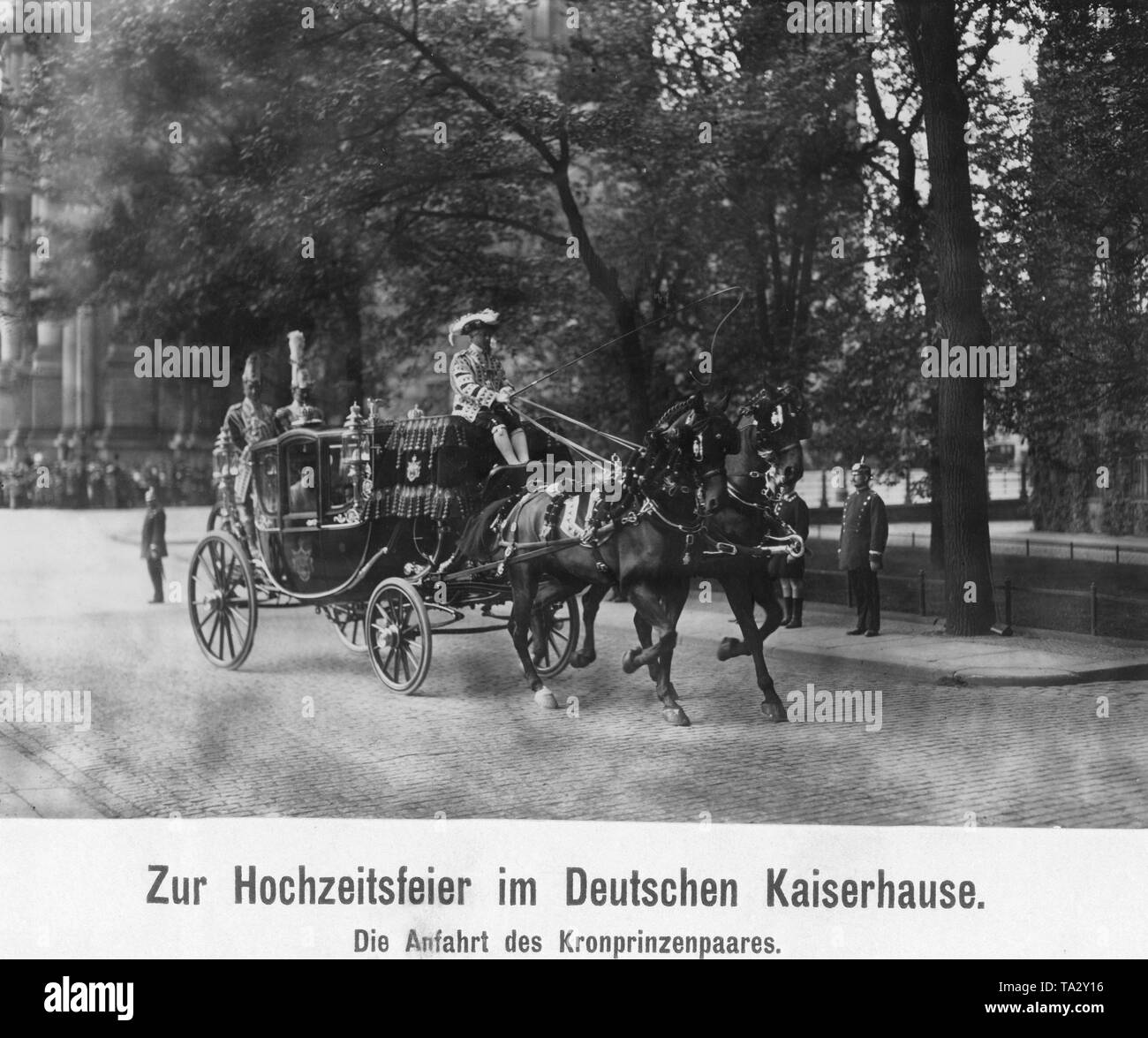 Crown Prince Wilhelm of Prussia and his wife Crown Princess Cecilie ride in a carriage through Berlin. The photo was taken as part of the wedding ceremony of the sister of the Crown Prince, Princess Viktoria Luise of Prussia, with Prince Ernst August of Hanover. Stock Photo