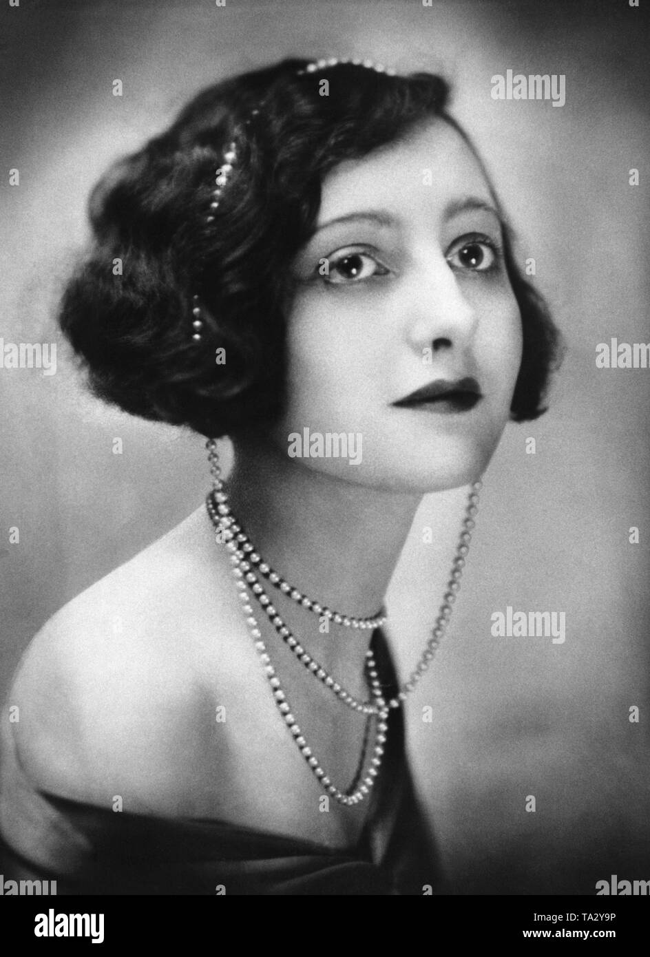 Woman With Contemporary Hair Fashion Of The 1920s Stock Photo