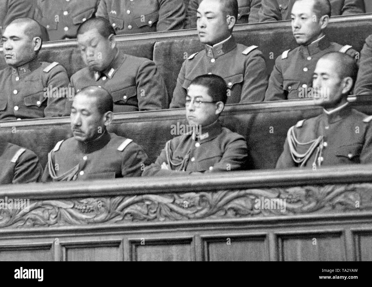 The Japanese prince Kanin Haruhito (first row, 2nd from right) during a session of the Japanese Diet on February 10, 1938 in Tokyo. Stock Photo