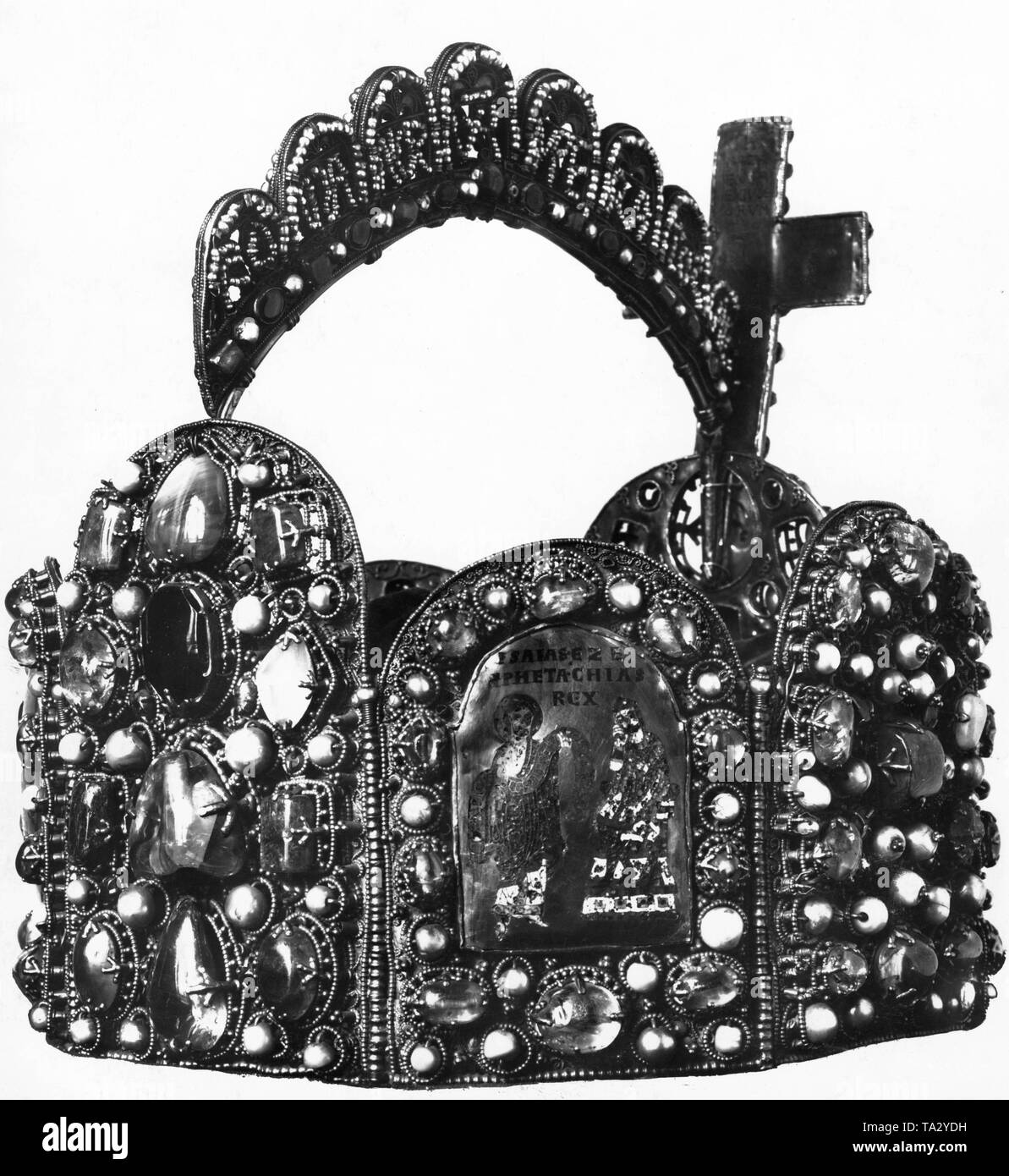The German Imperial Crown was made probably for the coronation of Otto the Great in the 10th century on Reichenau. The arch was added under Conrad II (1024-1039). Stock Photo
