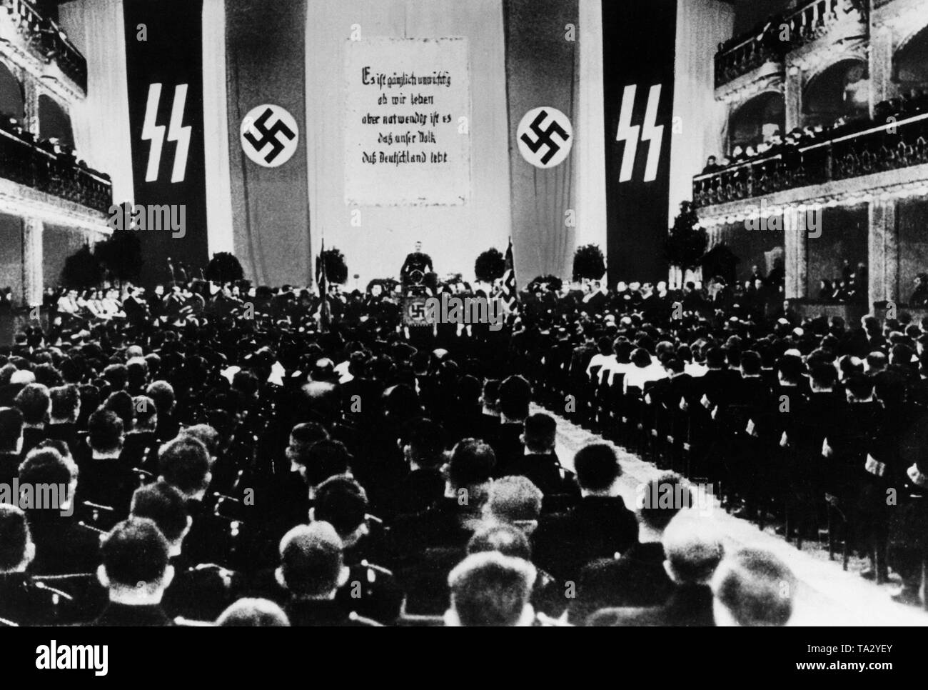Under the slogan 'It is utterly unimportant whether we live, but it is necessary that our nation, Germany lives!' from the declaration of Adolf Hitler and the Reich government before the German Reichstag on 1 September 1939 (war declaration to Poland) applicants from the NSDAP and Hitlerjugend in Prague are accepted to the SS. Stock Photo