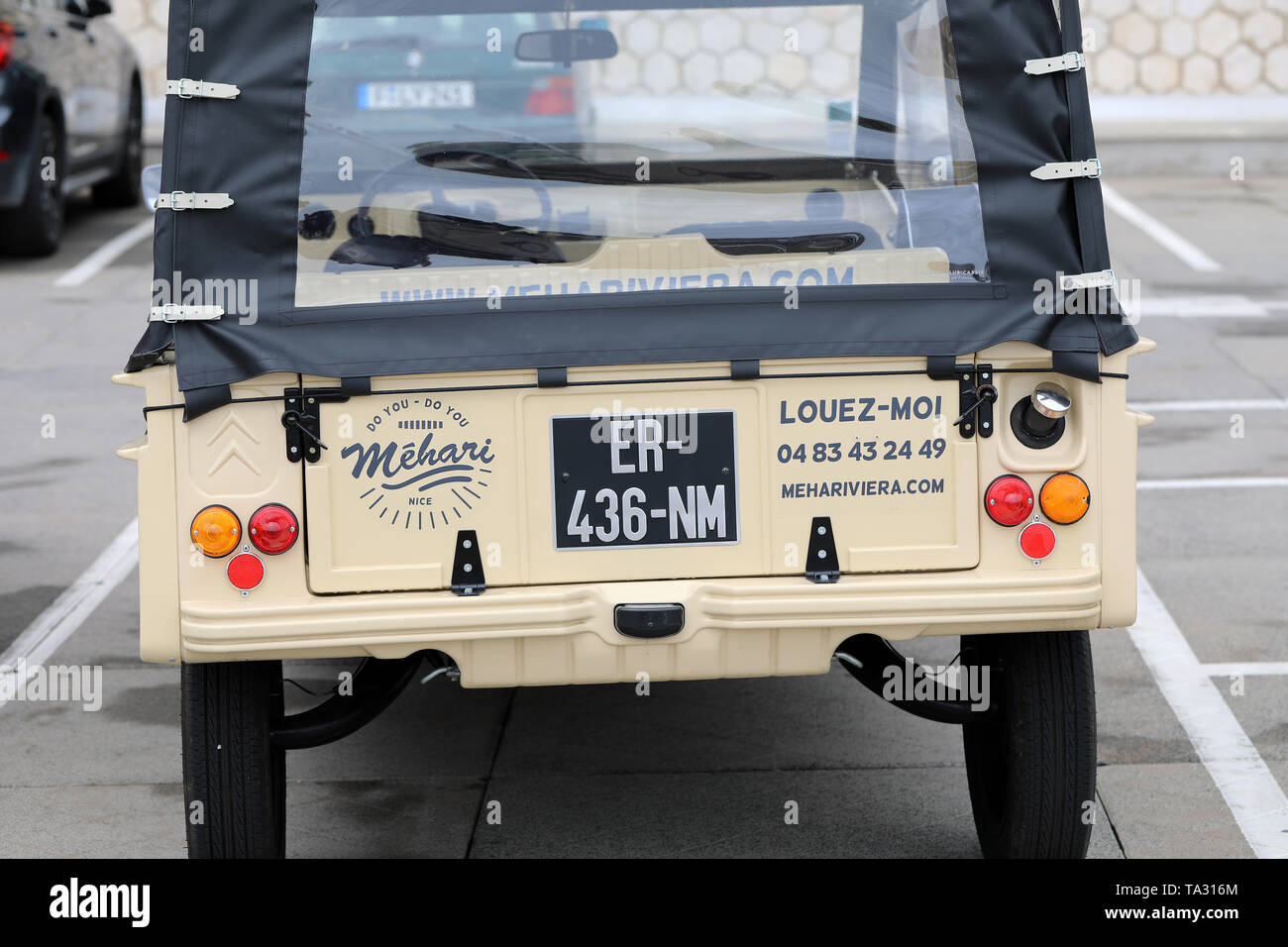 Nice, France - May 21, 2019: Vintage Beige Citroen Mehari (Rear View) French Car Parked In A Parking Lot In Nice On The French Riviera Stock Photo
