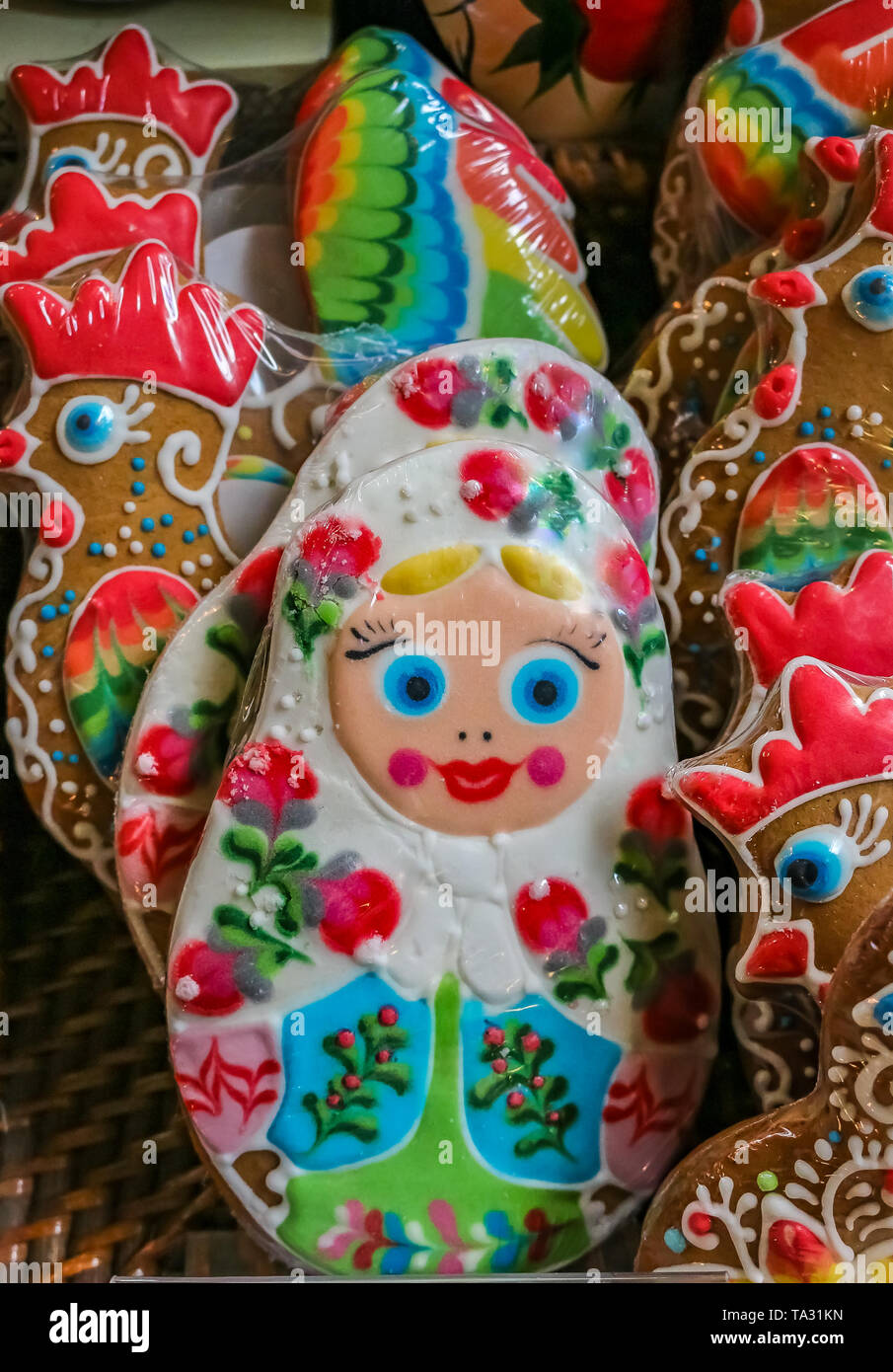 Ornate pryaniki, Russian honey spice cookies, shaped like matryoshka dolls on display at a grocery store  in Saint Petersburg, Russia Stock Photo