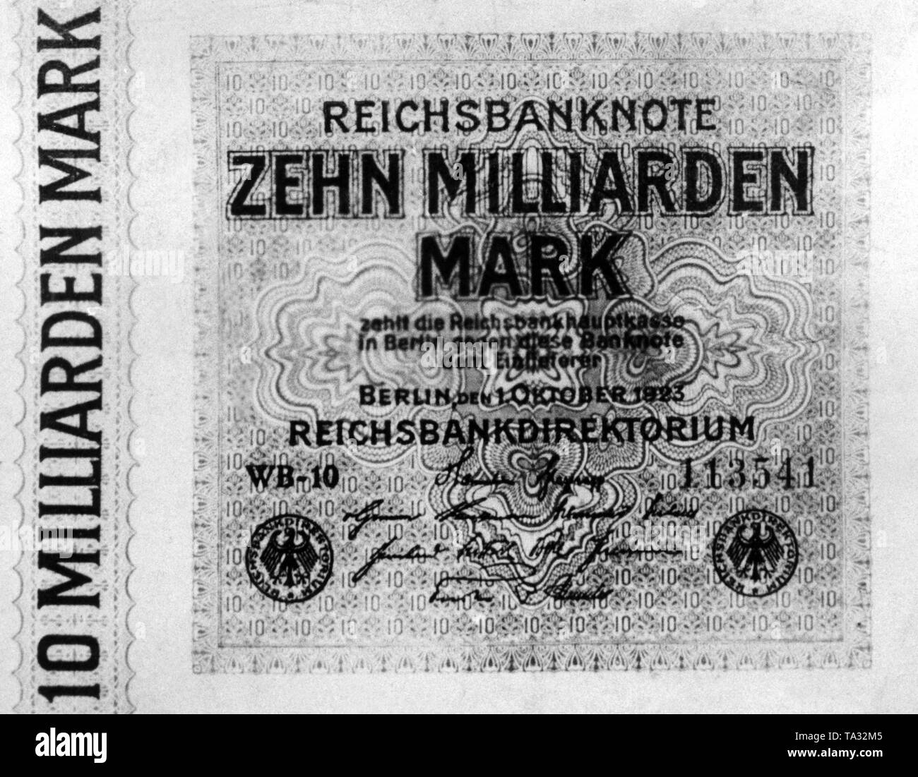 Ten billion Mark note. With the rising inflation, monetary values become more and more astronomical. Stock Photo