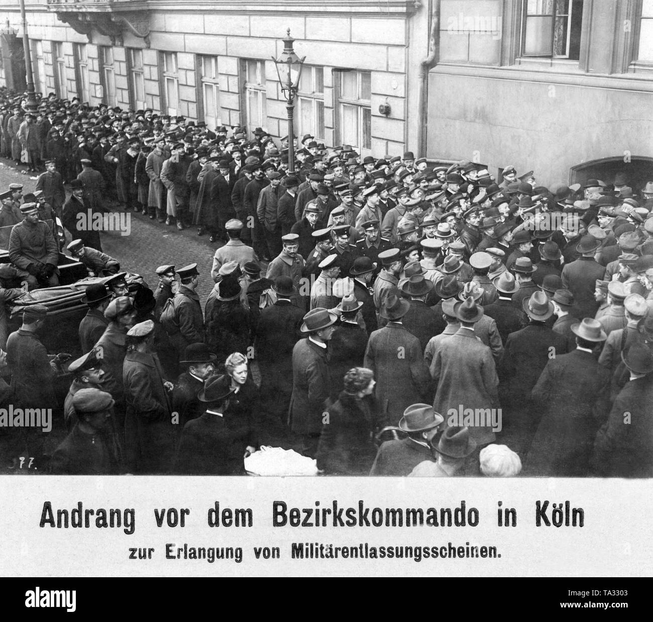 Soldiers are waiting at the entrance of the District Command in Cologne to collect their military discharge. Stock Photo