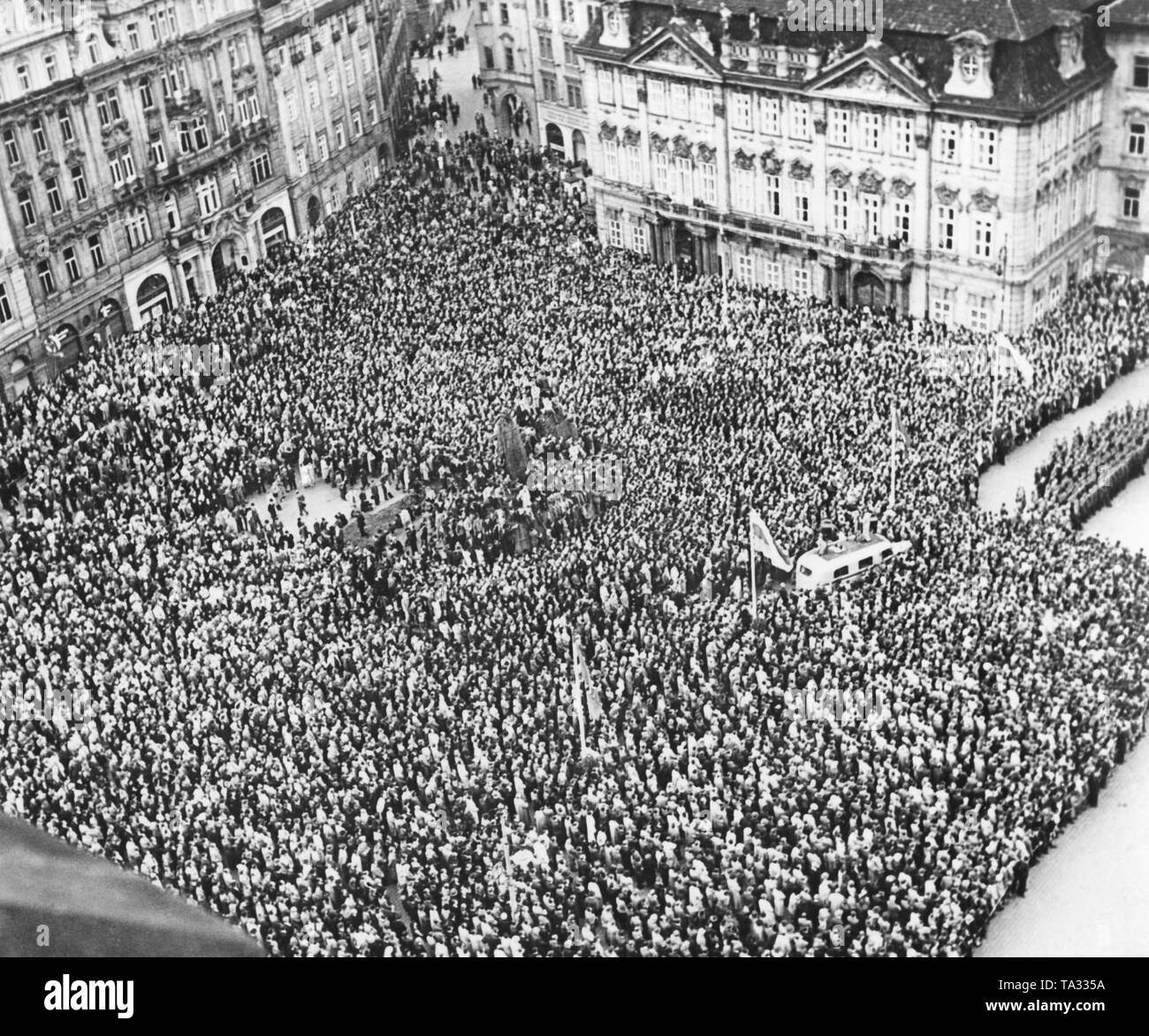 Rally at the Old Town Square in Prague on the occasion of Deputy Reich Protector Reinhard Heydrich's assasination. Prime Minister Jaroslav Krejci and Education Minister Emanuel Moravec give a speech at the rally. In May 1942 Czech resistance fighters committed an assassination attempt on the then-Deputy Reich Protector Reinhard Heydrich. Stock Photo
