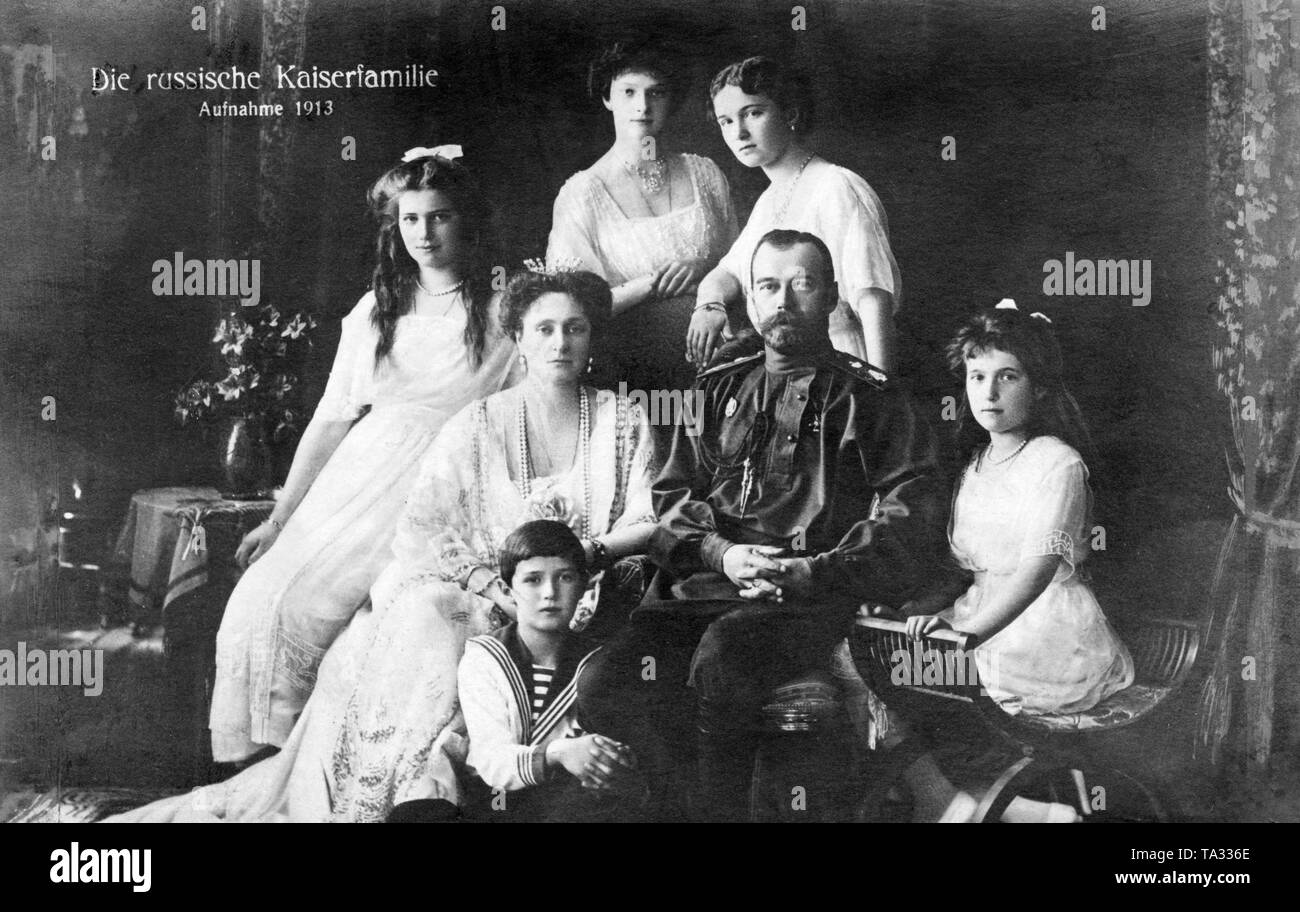 Family photo of the Romanovs from 1913. From bottom left: Tsarevich Alexei (Crown Prince), Alexandra Feodorovna (wife of Nicholas), Marija, Tatiana, Olga, Tsar Nicholas II of Russia, Anastasia. Stock Photo