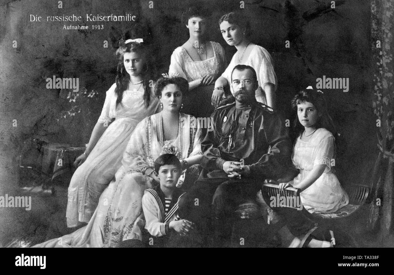 Family photo of the Romanovs: (from left) the daughters Maria, Tatjana, Olga and Anastasia. The parents Tsarina Alexandra Feodorovna and Tsar Alexander II of Russia. Sitting on the floor the son and successor to the throne, Alexei. Stock Photo