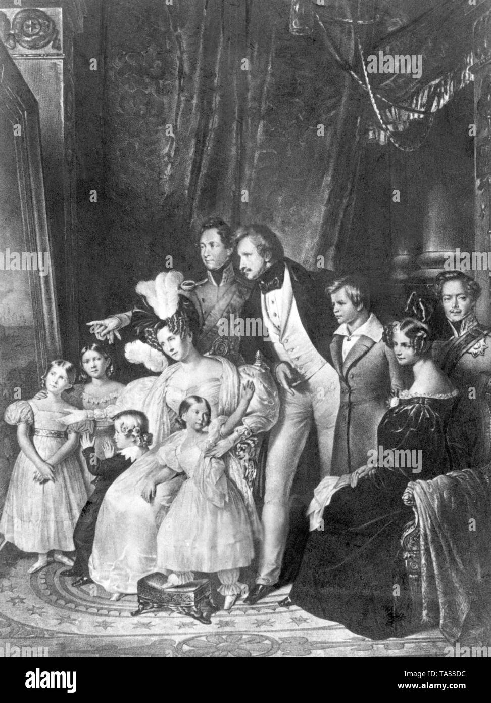 This painting shows King Ludwig I in the circle of his family: from left to right: Princess Adelgunde, Princess Hildegard, Prince Adalbert, Queen Theresa, Princess Alexandra, Crown Prince Max, King Ludwig I, Prince Luitpold, Grand Duchess Mathilde of Hesse, Grand Duke Ludwig of Hesse. Undated painting, probably from the 1830s. Stock Photo