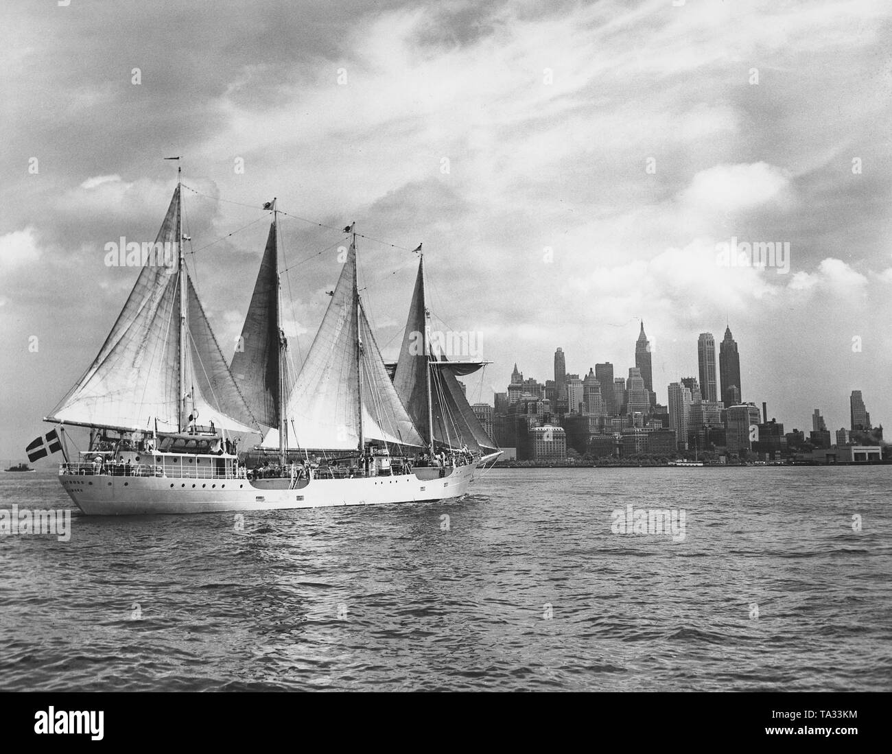 The Swedish training ship Albatros in front of the New York City skyline. The training ship is operated by a private company. Stock Photo