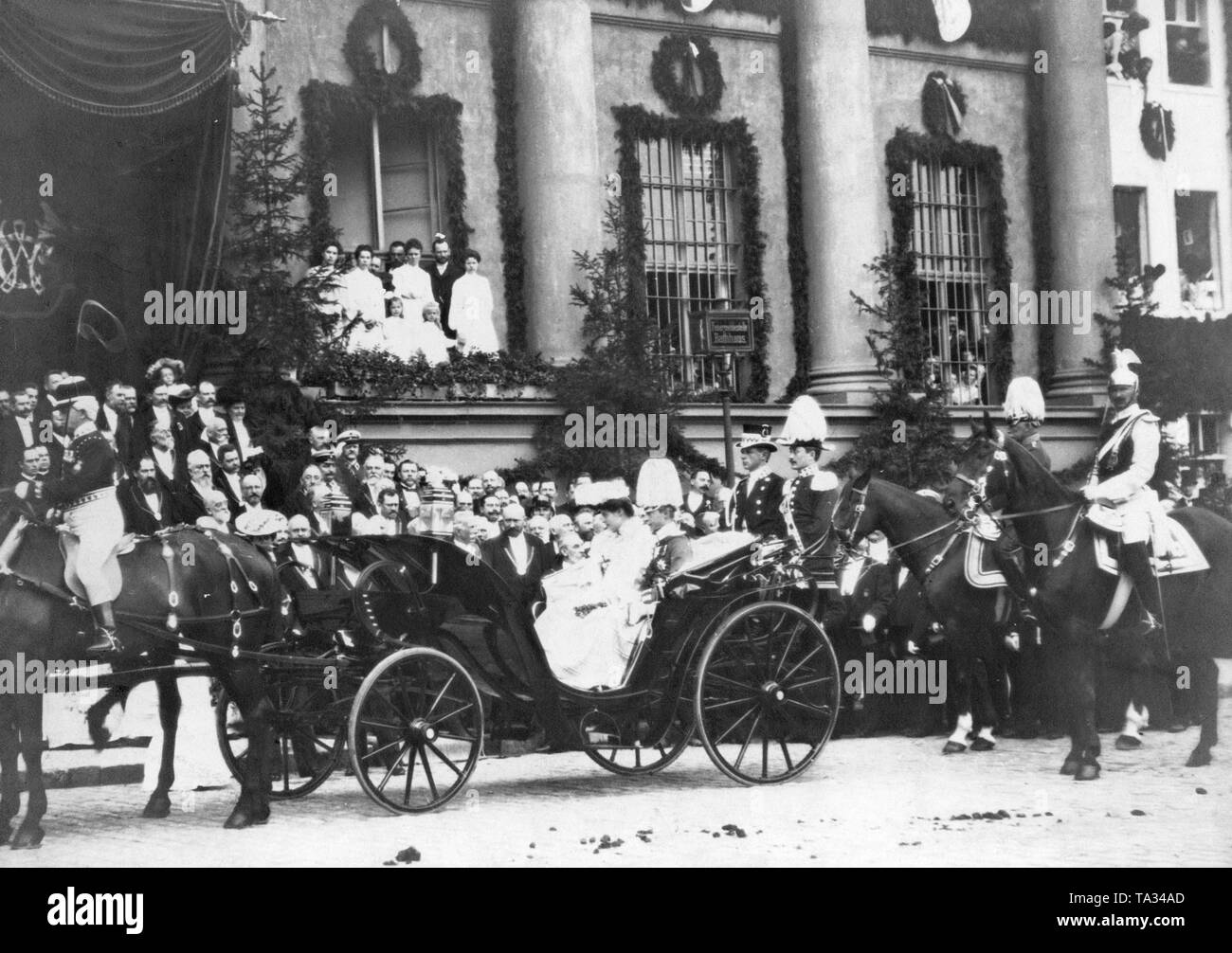 Crown Princess Cecilie of Mecklenburg and Crown Prince Wilhelm of Prussia here in a carriage in front of the Potsdam Town Hall during the multi-day celebrations in Berlin and Potsdam. The newlywed couple receives the congratulations of the Lord Mayor of Potsdam. Stock Photo