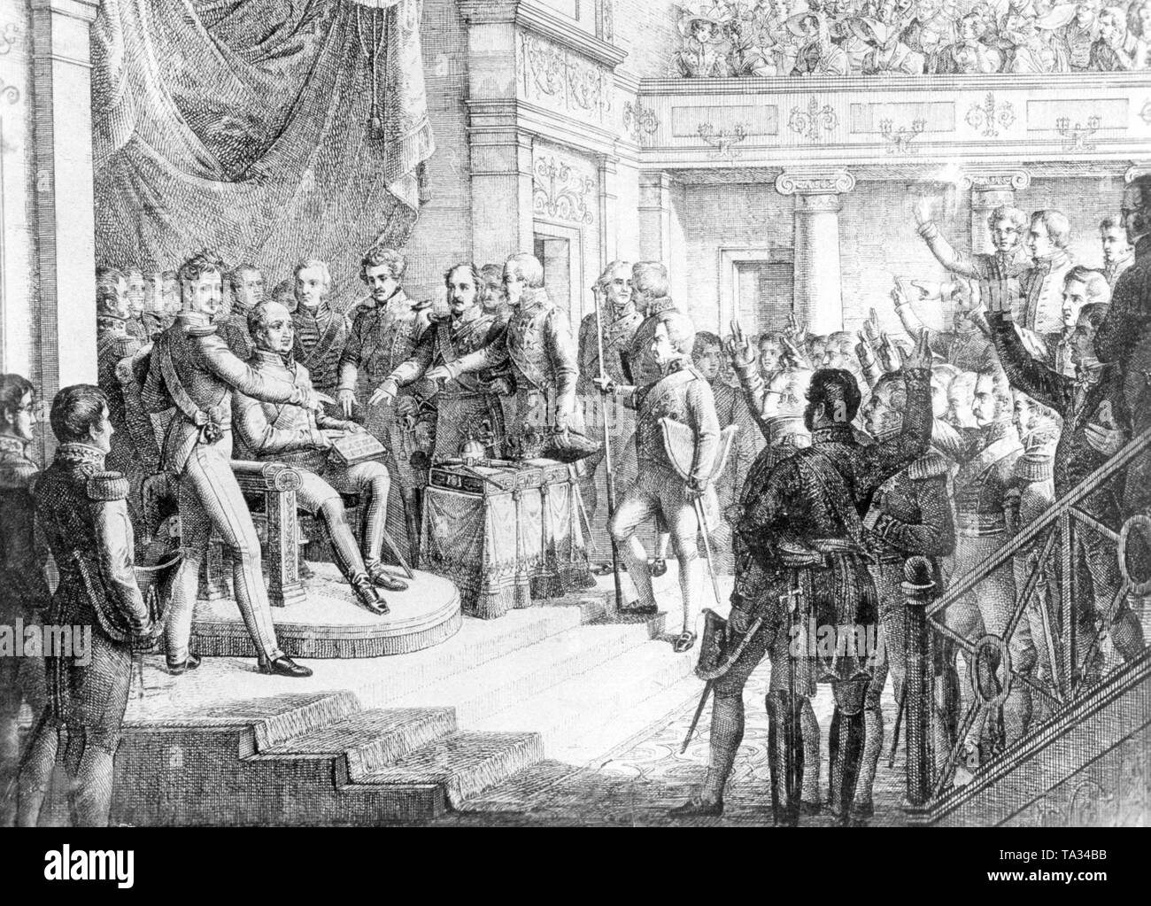 This painting shows King Maximilian I Joseph of Bavaria (left on throne), who gives his people the constitution, left next to him Crown Prince Ludwig, later King Ludwig I of Bavaria. Through the constitution, Bavaria became the eighth state of the German Confederation. In this constitution, the question of representation was regulated. The constitution was valid until the end of the Bavarian Kingdom in 1918. Maximilian I Joseph of Bavaria was the son of Frederick Michael, Count Palatine of Zweibruecken, husband of: 1. Princess Wilhelmine Auguste of Hesse-Darmstadt (1785), 2. Princess Karoline Stock Photo