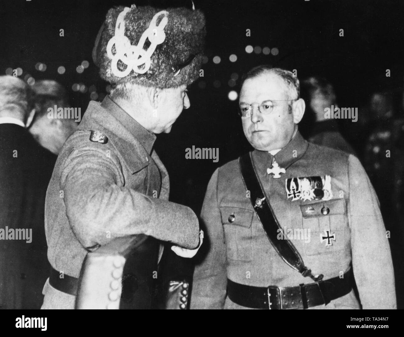 The Reichsfuehrer of the Stahlhelm, Franz Seldte (right), is talking to Wilhelm, German Crown Prince, dressed in the uniform of the Totenkopfhusare (Prussian regiment with a skull symbol on their fur caps). Stock Photo