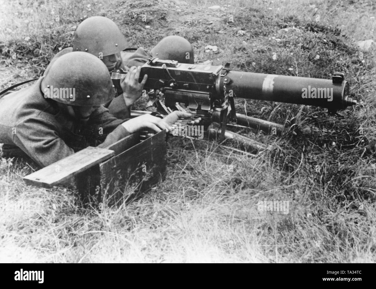 Soldiers of the Czechoslovak army with heavy machine guns. Stock Photo