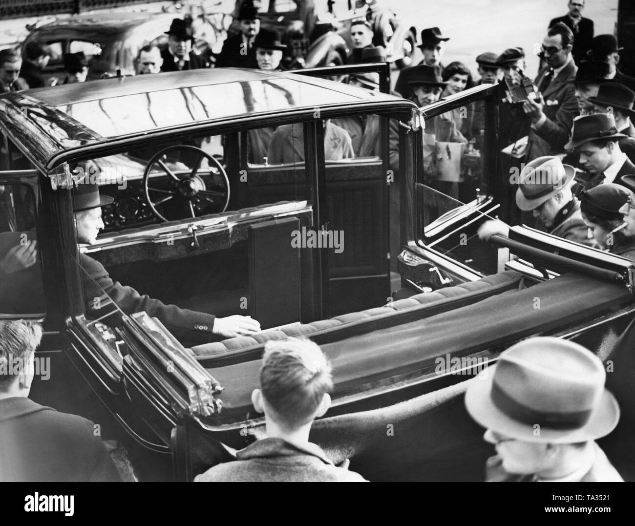 The limousine of British King George VI, a Daimler Straight Eight Landaulet with glass roof. Stock Photo