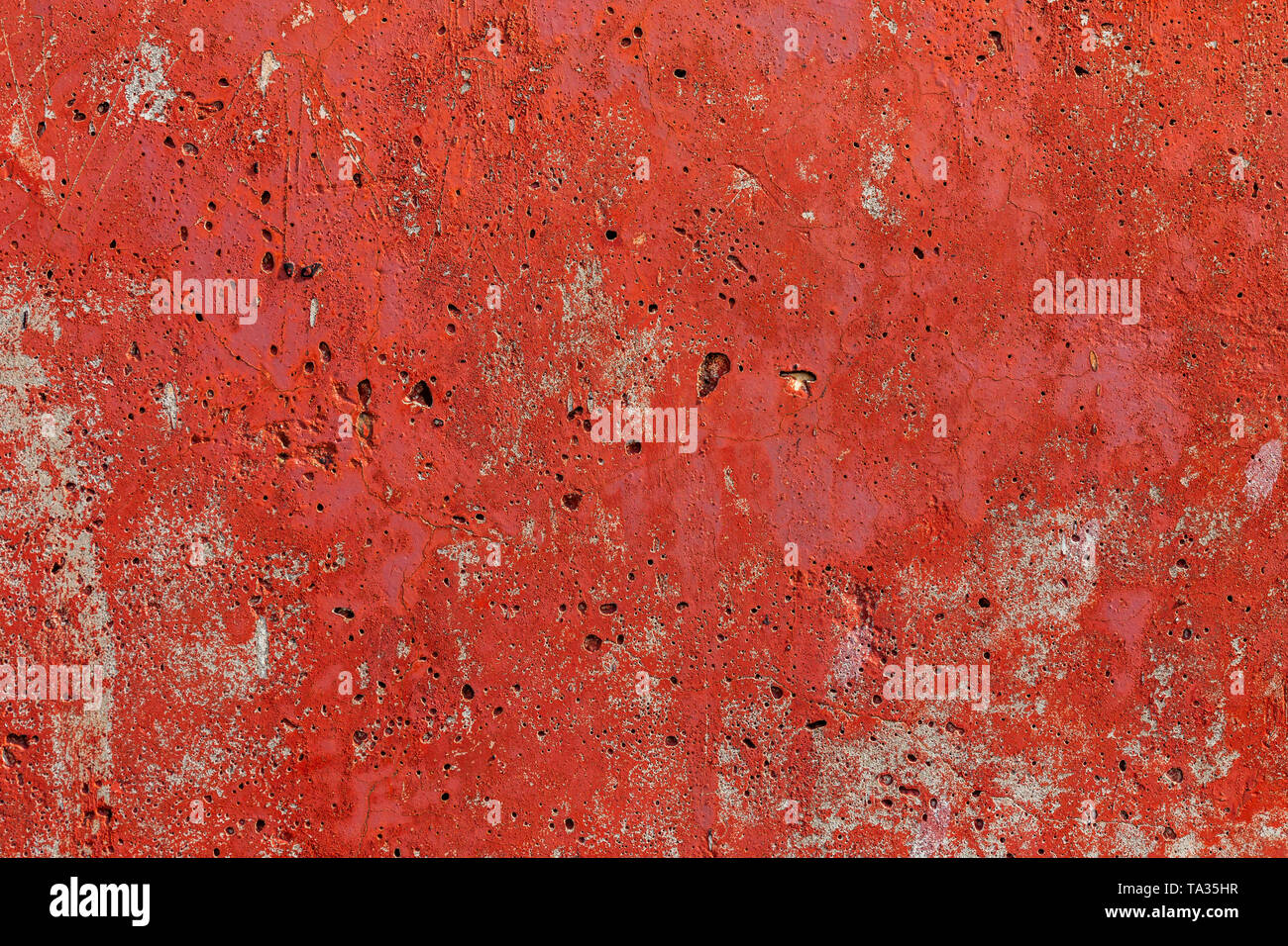 monocolor orange painted flat concrete surface closeup texture Stock Photo