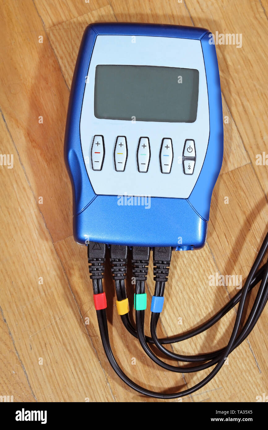 Electro muscle stimulation appliance for weight loss Stock Photo Alamy