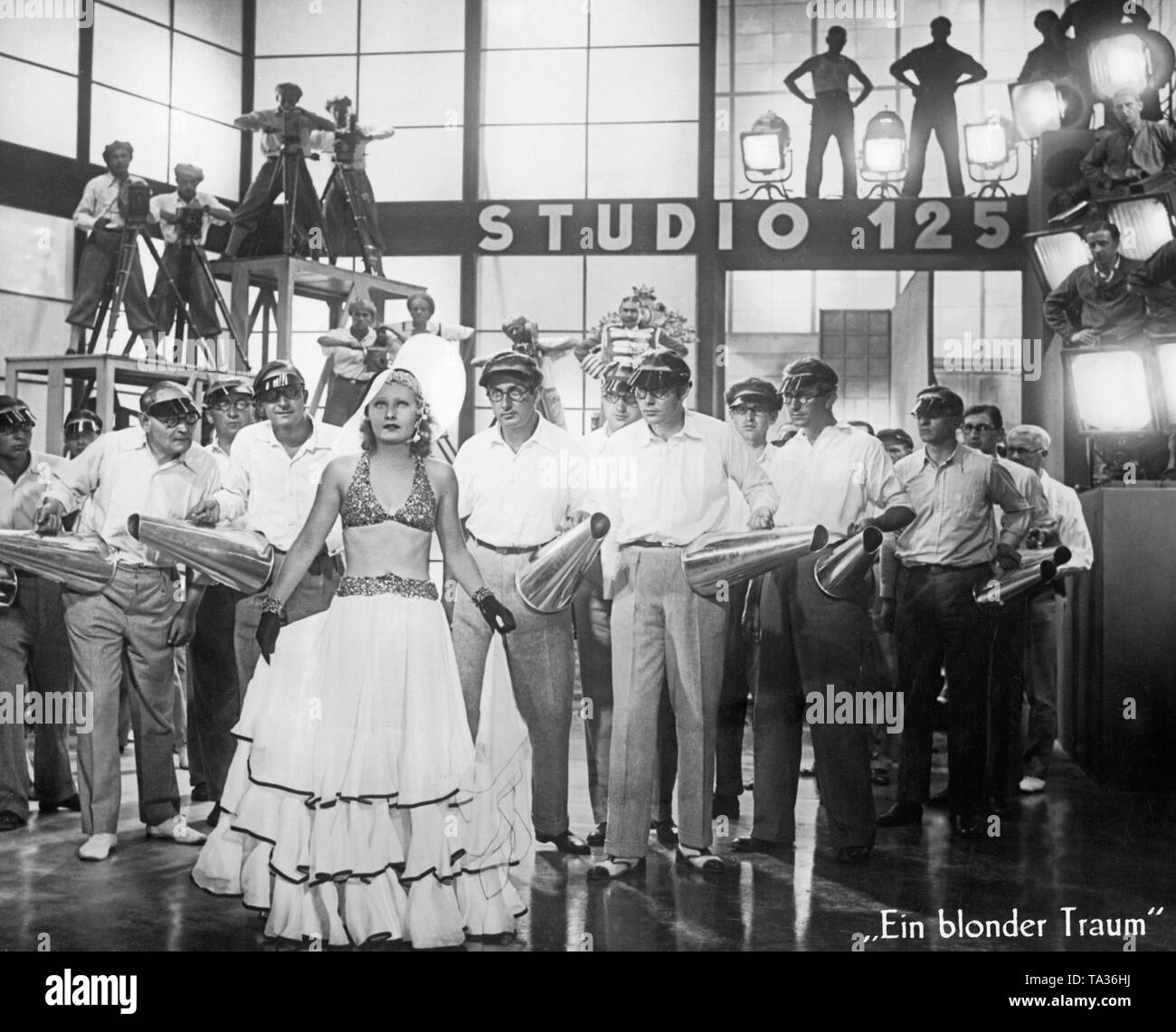 Lilian Harvey as Jou-Jou in the musical comedy 'A Blonde Dream' in the UFA studio, directed by Paul Martin. This was one of the most successful films in the late phase of the Weimar Republic. Stock Photo