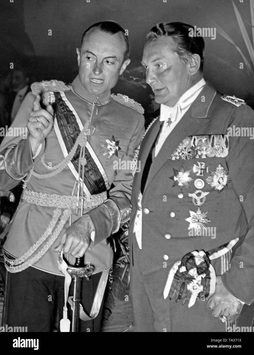 Prince Regent Paul of Yugoslavia and Hermann Goering in a conversation during a break of the opera 'Meistersinger von Nurenberg', which had been performed in honor of the guest in the Staatsoper. Stock Photo