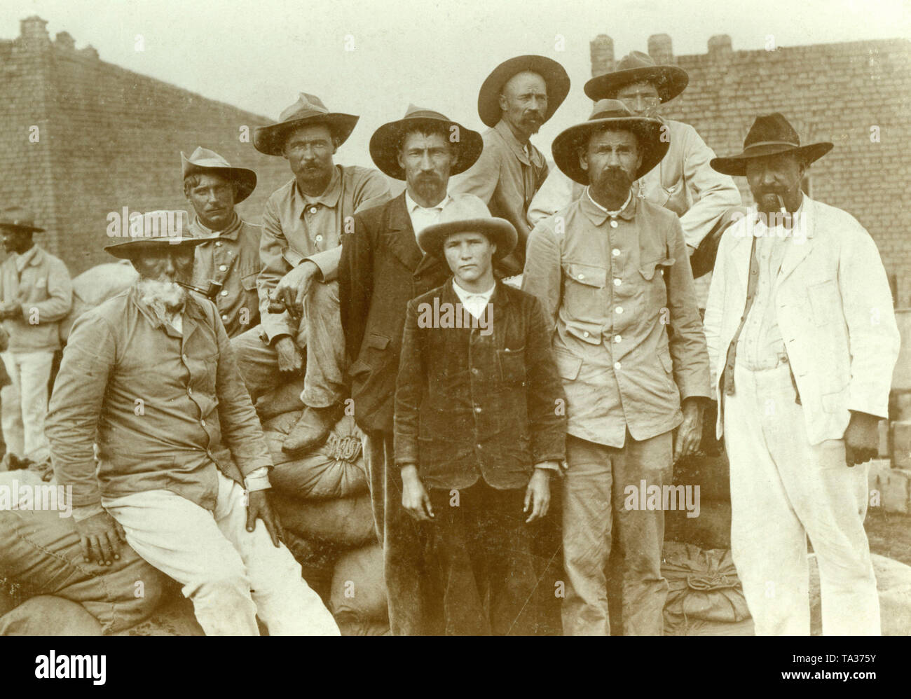 Boer men working for German colonialists in German South West Africa. Stock Photo